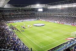 Acción de juego en la Kirin Cup